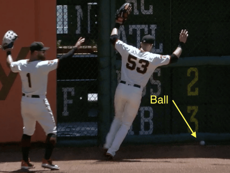 Ball gets lodged in outfield wall. What happens now? Baseball Rules