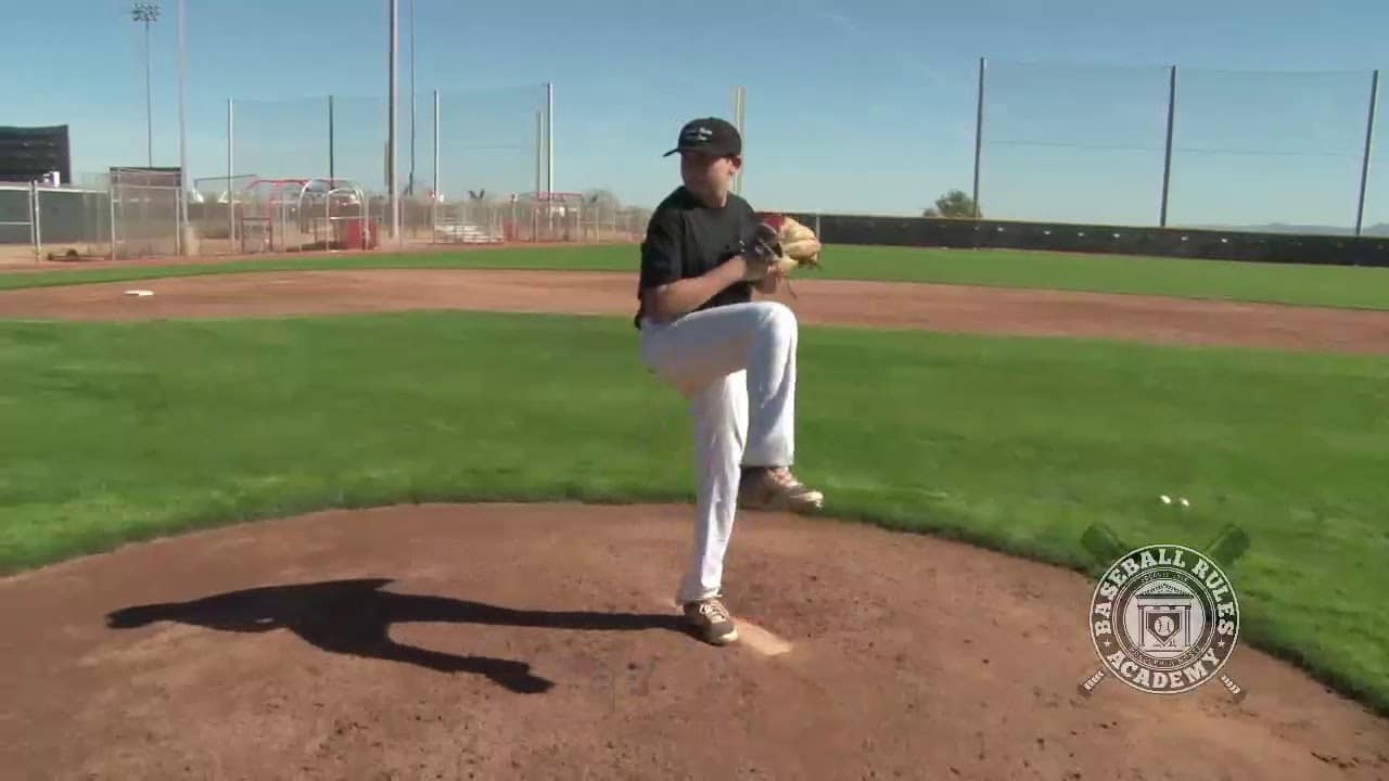 Yes, this is a Legal Pickoff Move Baseball Rules Academy