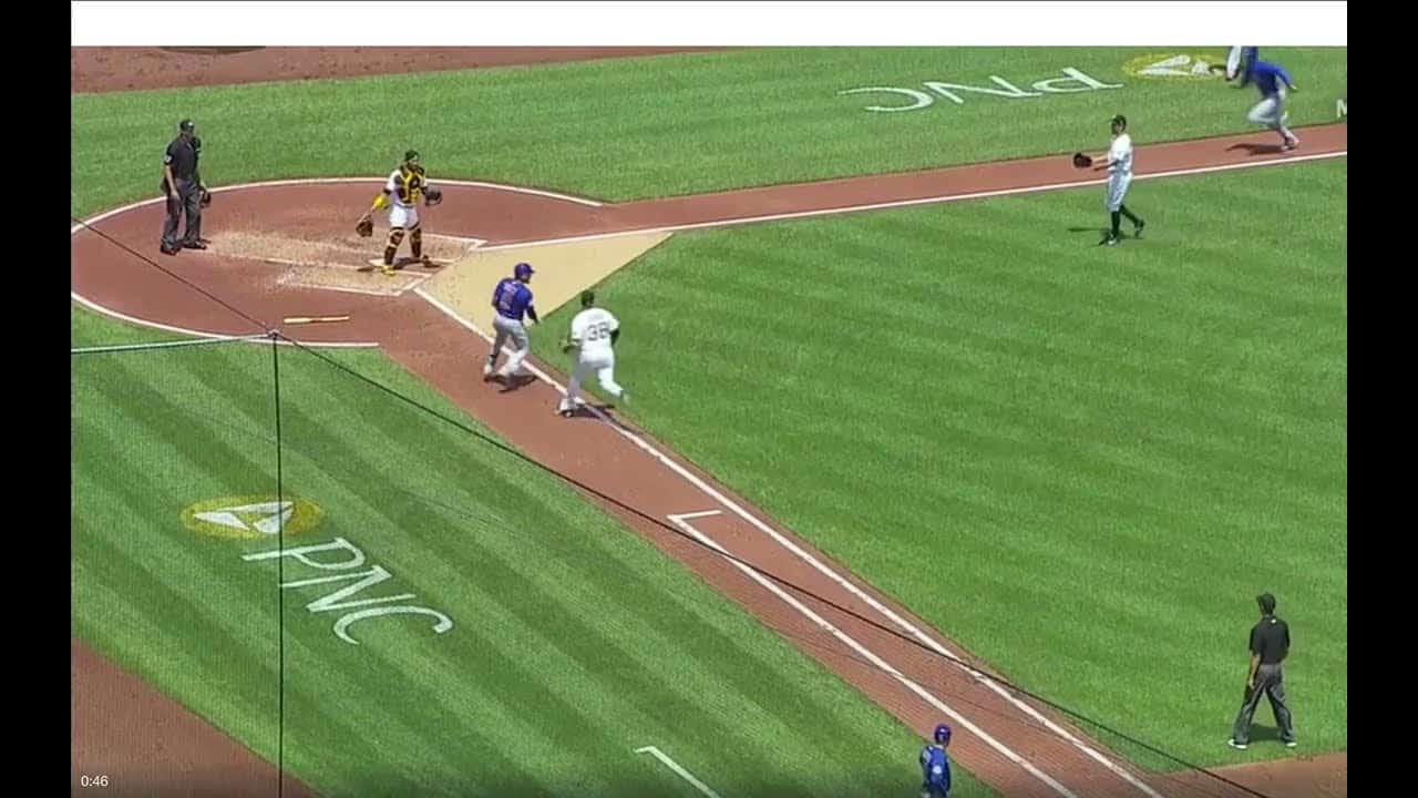 Javier Báez rundown between first and home