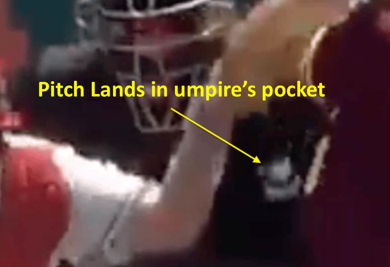 Ball ends up in umpire's front pocket