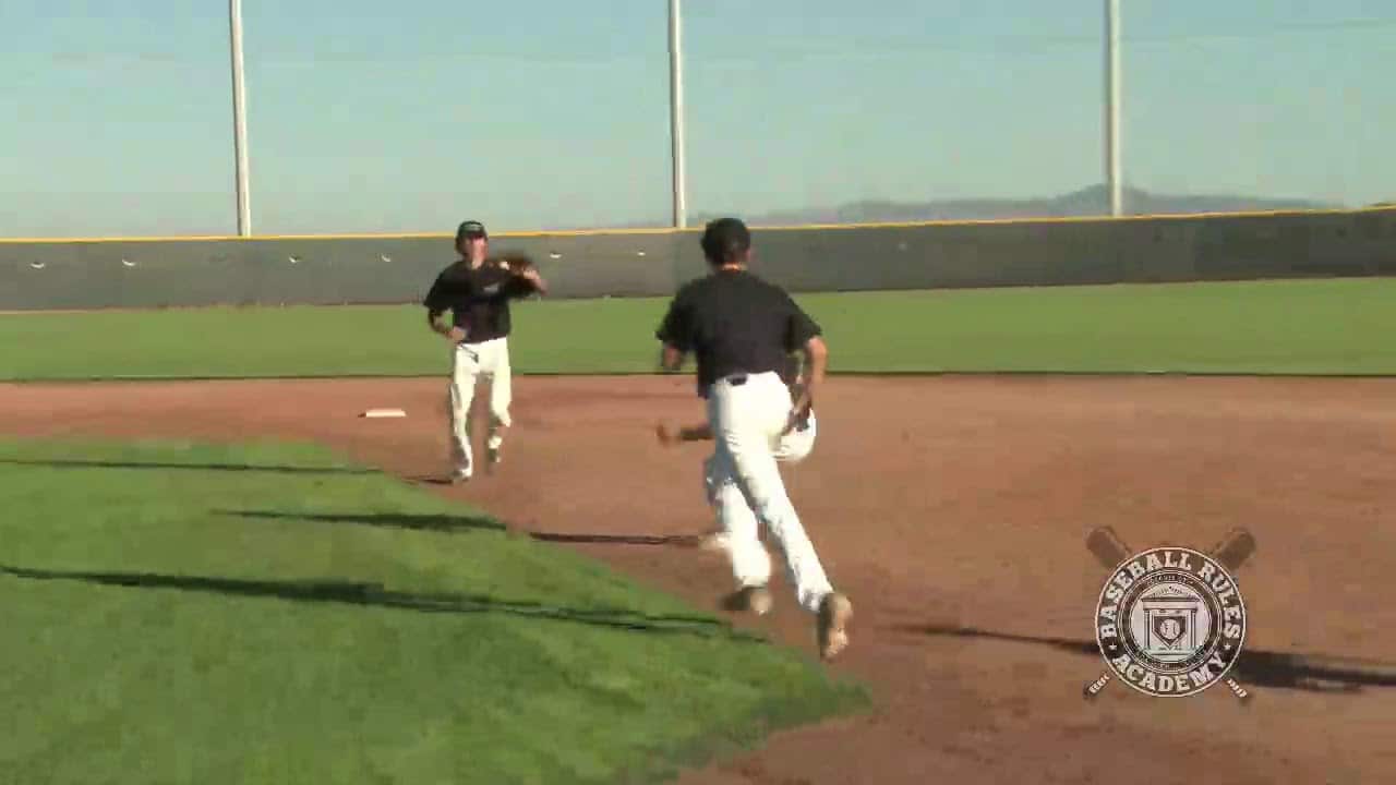 Can a Baserunner Intentionally Touch a Thrown Ball During a Rundown