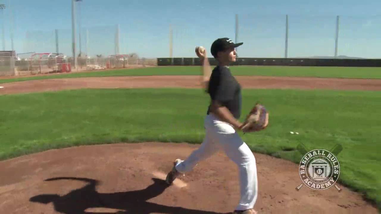 Pitcher Swings His Free Foot Past the Back of the Rubber and then