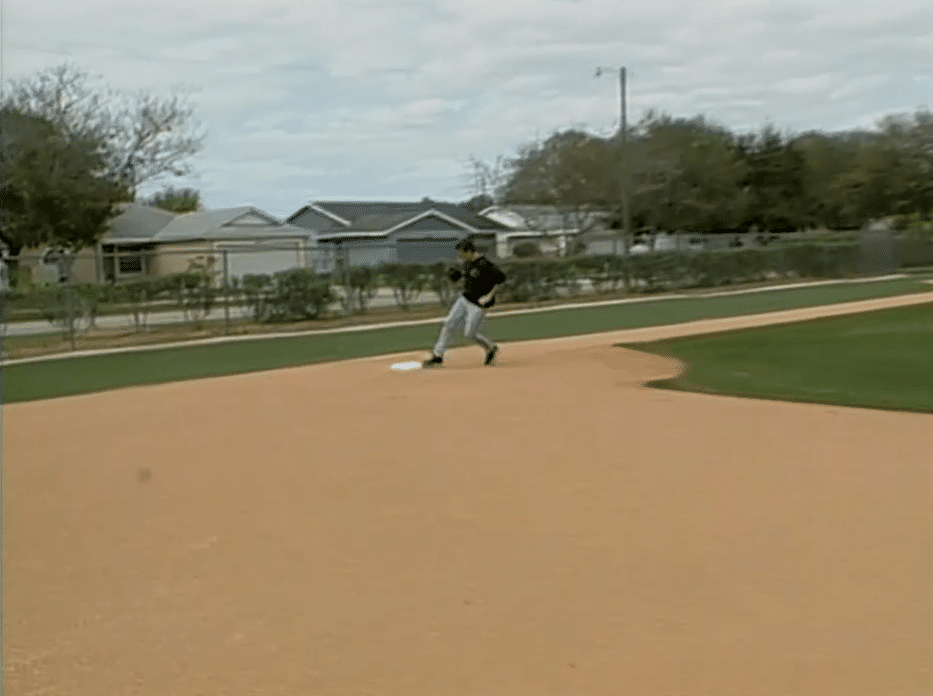 Throwing a Ball to a Pitcher Covering First Base Baseball Rules Academy